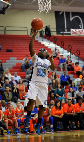 Centennial’s Tanjanae Wells lays up the ball against Bishop Gorman during the Sunset R ...