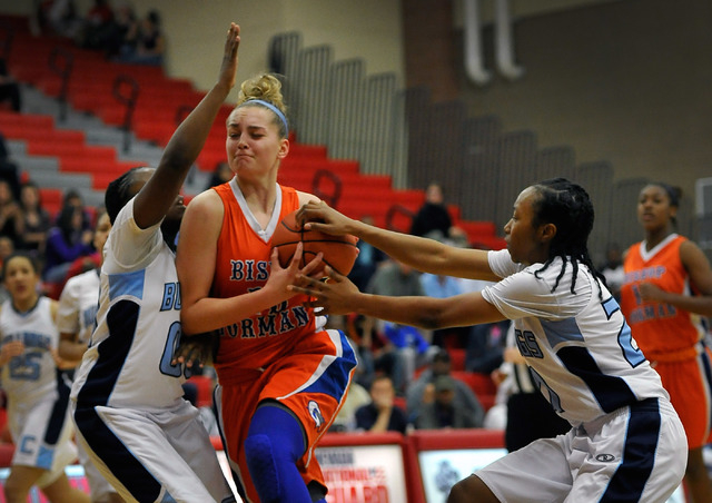 Bishop Gorman’s Megan Jacobs, center, is double teamed by Centennial’s Tanjanae ...