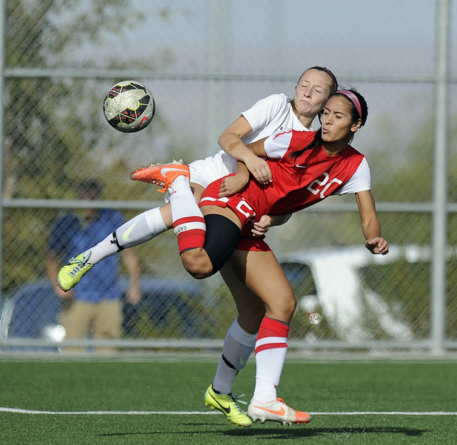 Coronado forward Michaela Morris (20) battles Arbor View defender Jamie Wilson during the Di ...