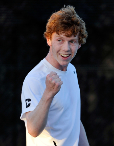 Palo Verde’s Rhett Bossung reacts after winning a point against Desert Oasis’ Be ...