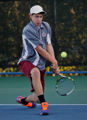 Desert Oasis’ Ben Gajardo goes for a backhand during Monday’s Sunest Region boys ...