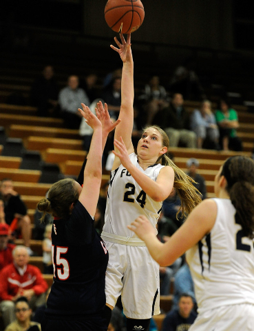 Foothill’s Gabby Doxtator (24) shoots over Coronado’s Alex Snoblen during Thursd ...