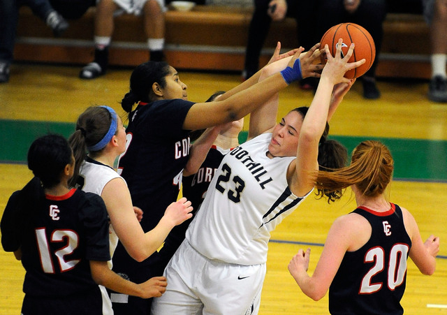 Foothill’s Indoneisha Struve (23) grabs a rebound against Coronado’s Samantha Gr ...