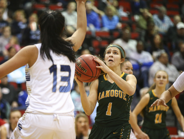 Bishop Manogue guard Katie Turner (1) shoots against Foothill during the Class 4A girls stat ...