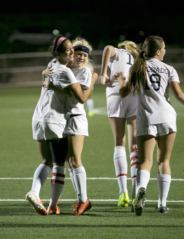 Coronado’s Michaela Morris, left, and Carli Young embrace after Morris scored a goal d ...