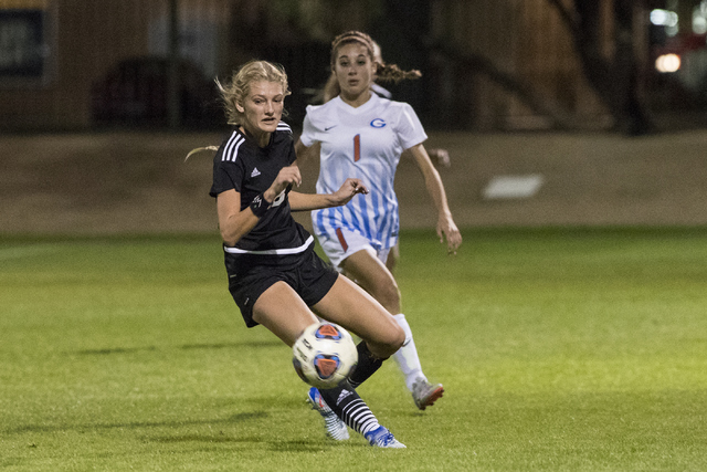 Alexis Lloyd (8) from Palo Verde School battles for the ball against Jaden Terrana (1) from ...