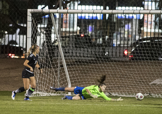 Bishop Gorman’s goalie Kristen Kircher, right, cannot stop a shot as Palo Verde’ ...