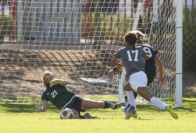 Palo Verde’s Kailee Barnhard (21) blocks the ball while playing Arbor View during the ...