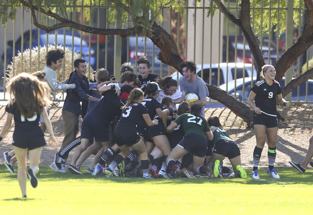 Palo Verde players celebrate after defeating Arbor View during the Sunset Region girls socce ...