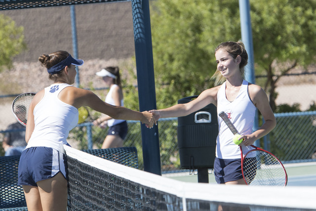 Coronado senior Nikoletta Nikoloff, left, shakes hands with Liberty junior Jocelyn Starr fol ...