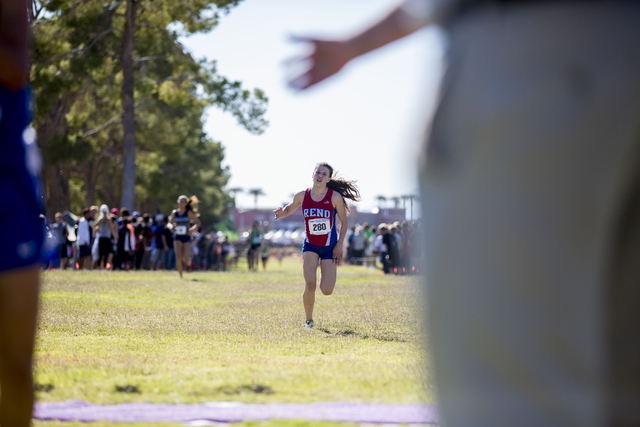 Kyra Hunsberger, Reno, encloses on the finish line of the 3.1 mile in the 2016 NIAA Nevada S ...