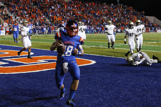 Bishop Gorman quarterback Tate Martell slips into the end zone past the St. John Bosco defen ...