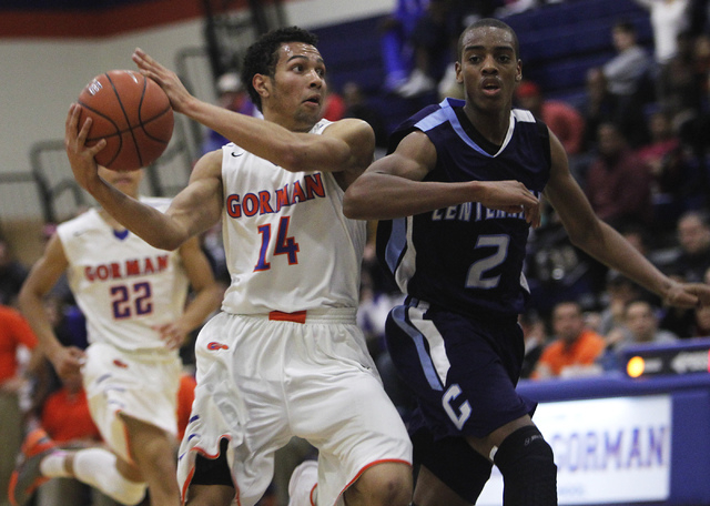 Bishop Gorman senior point guard Noah Robotham (14) looks to pass against Centennial’s ...