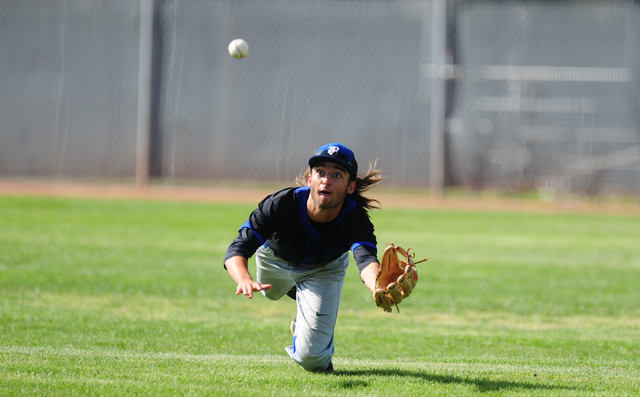 Basic right fielder Christian Santillanes is unable to catch a Silverado looper in the first ...