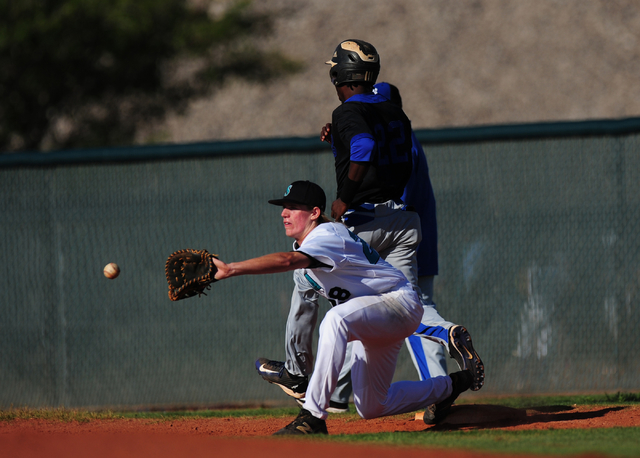 Basic base runner J.J. Smith legs out a ground ball for a base hit while Silverado first bas ...