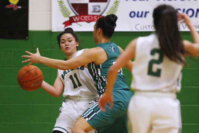 Green Valley guard Gracelle Garcia passes around Rancho guard Tatianna Lee during their game ...