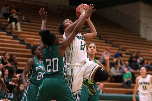 Green Valley’s Yamilei Rodriguez is defended by Rancho guard Ashlynn McCall during the ...