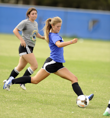 Green Valley girls soccer player Madison Holborow fires a shot during practice (Josh Holmber ...