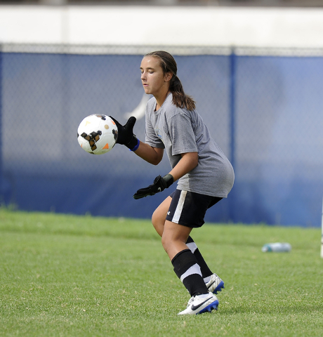 Green Valley girls soccer freshman goalkeeper Ryan Sabol makes a save during practice. (Josh ...