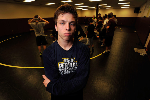 Faith Lutheran wrestler Owen Lawrie poses during a short break from training at Faith Luther ...