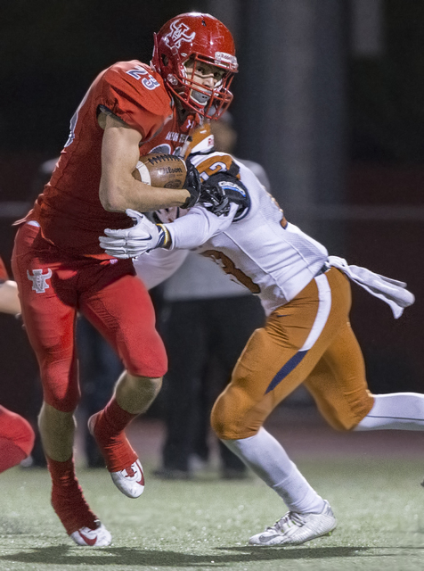 Arbor View’s Deago Stubbs (23) runs past Legacy’s Marcellus McCoy (13) during th ...