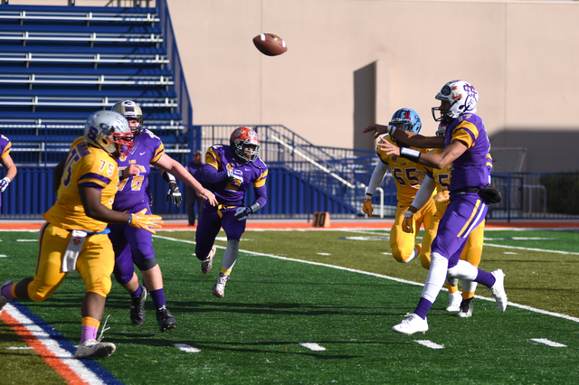 Sunset Region quarterback Christian Tasi (17) throws a pass against the Sunrise Region durin ...