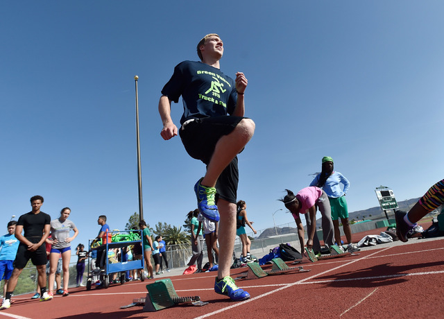 Ian Mack readies himself on the track at Green Valley High School on Tuesday, April 7, 2015. ...