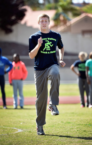 Ian Mack warms up during practice at Green Valley High School on Tuesday, April 7, 2015. Mac ...