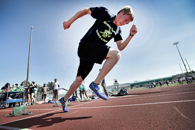 Ian Mack practices with the starting block at the Green Valley High School track on Tuesday, ...