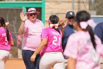 Foothill softball head coach Tom Mayes, left, along with Foothill coach Zenon Brooks, right ...