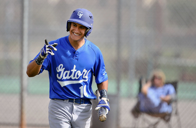 Green Valley’s Keola Paragas gestures after scoring a run during a recent game against ...