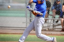 Green Valley’s Keola Paragas swings for the ball during a recent game against Las Vega ...