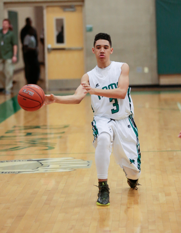 Rancho High School’s Chrys Jackson (3) stops to pass the ball to a teammate during a b ...