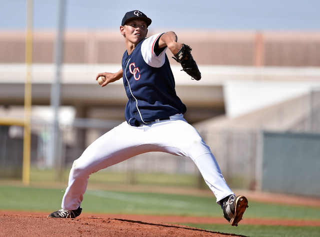 Coronado High School pitcher Adam Garcia delivers the ball against Silverado during a first ...