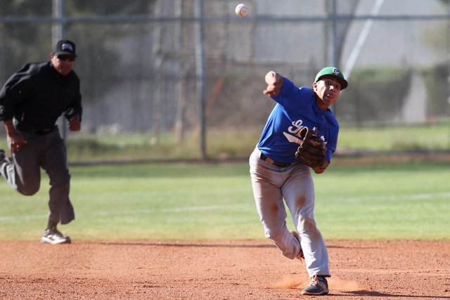 Green Valley’s Jimmy Montiel (6) throws the ball to first base for an out in the secon ...