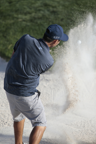 Foothill High School Senior Andrew Chu, hits his ball out of a sand trap during final round ...