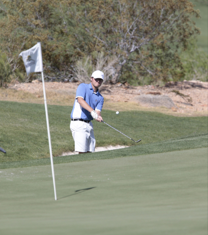 Green Valley High School’s Sean Berman, hits his ball out of a sand trap during the fi ...