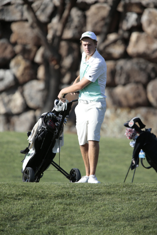 Palo Verde High School’s Jack Trent, prepares to move his golf bag, during the final r ...