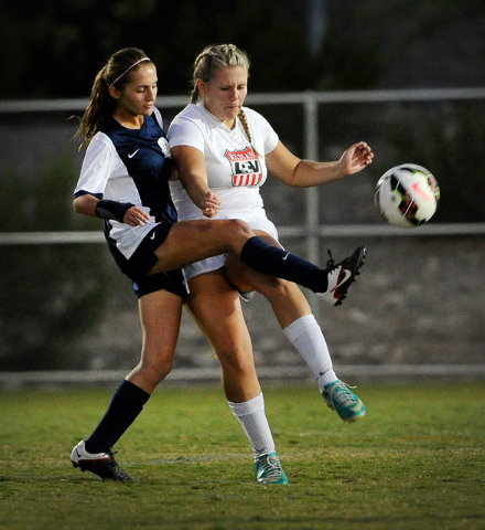 Foothill’s Allison Stubberud, left, reaches around Las Vegas High’s Alyson Rhoad ...