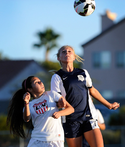 Las Vegas High’s Alicia Nunez, left, and Foothill’s Sydnee Farrer go for the bal ...