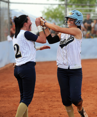 Foothill’s RaeAnn Brems (2) congratulates teammate Katelyn Enzweiller after she scored ...