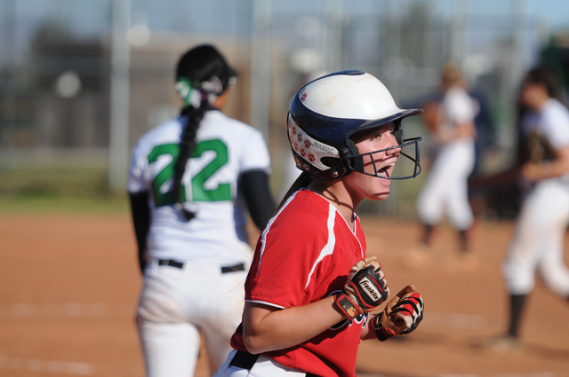 Coronado’s Lauren Buck (3) celebrates her team’s tying run in the seventh inning ...