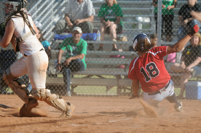 Coronado’s Jillian James (18) slides home for a run against Rancho in the Sunrise Regi ...