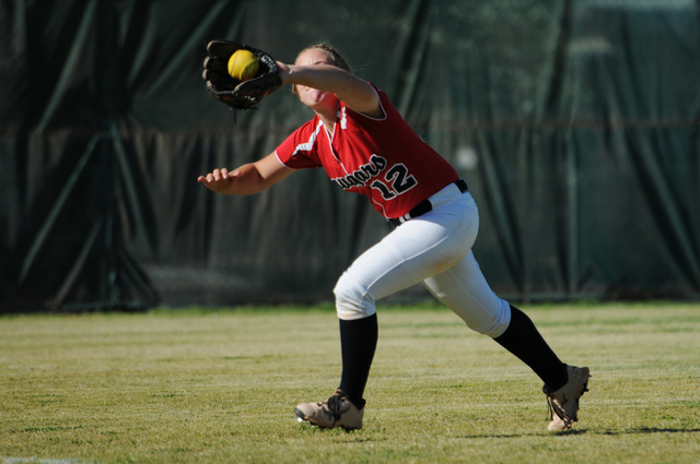 Coronado’s Brooke Younie (12) makes a catch in the outfield against Rancho in the Sunr ...