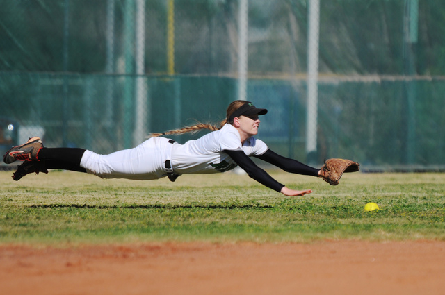 Rancho’s Sam Megan Sloan (7) can’t come up with a diving catch against Coronado ...