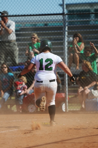 Rancho’s Jacey Kelley (12) scores a run in the Rams 3-2 win over Coronado on Wednesday ...