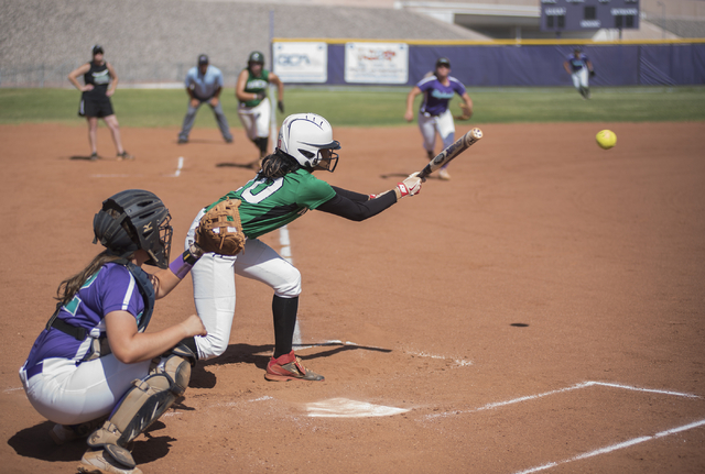 Rancho’s Jahnae Davis-Houston (10) throws down a bunt against Silverado during the fir ...