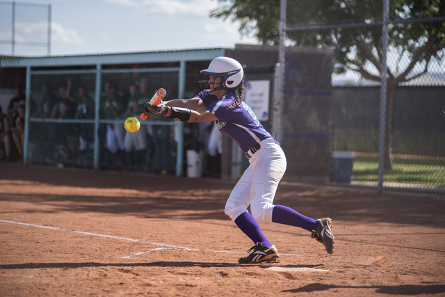 Silverado’s Hanna McCall (10) throws down a bunt against Rancho during the first round ...