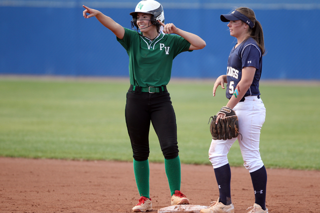 Palo Verde freshman Makall Whetten celebrates after hitting a double as Samantha Milanovich ...