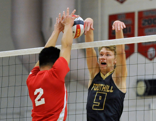 Las Vegas’s Royce Reyes (2) blocks a shot by Foothill’s Zach Thompson during the ...